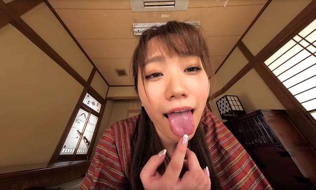 Hono Wakamiya in a POV VR scene with medium tits, touching her breasts during a 60 FPS orgasm sequence.