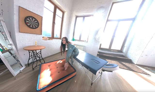 Brunette Monika Akai wears a garter belt in a solo Russian VR scene filmed in 60 FPS without POV angles.