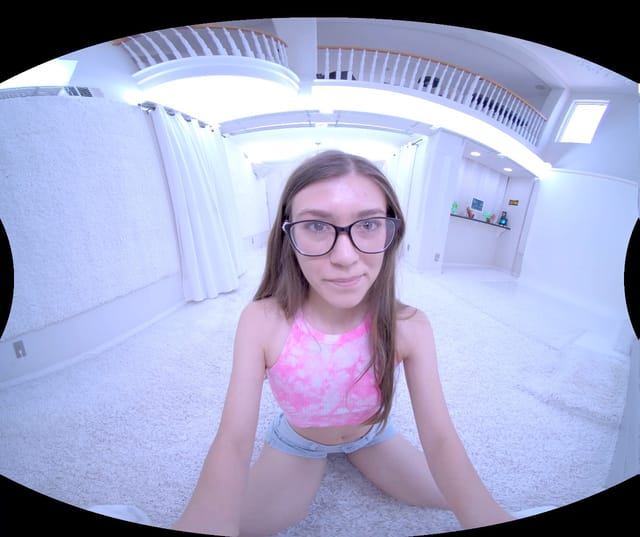 Brunette model Ali Jones strips solo in a close-up shot for New Porn Starlets in high frame rate VR video.