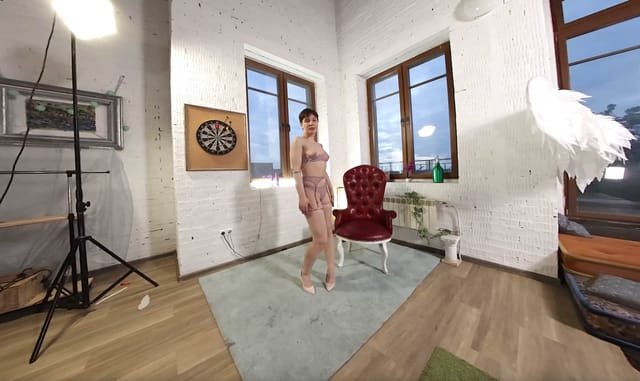 Vanessa Von poses in blue lingerie during a non-POV VR scene with medium breasts filmed in 60 frames per second by Luminous.
