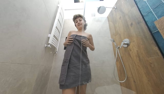 Brunette model Acabella showers solo in a VR scene with medium breasts, filmed in 60 frames per second by LIN VR.