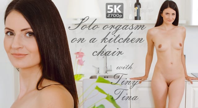 Brunette model Tiny Tina sits on a kitchen chair for a solo orgasm in a 4K 60 FPS VR video.