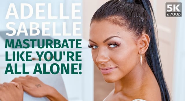 Adelle Sabelle performs a solo masturbation scene in a realistic 180-degree VR environment captured in 4K resolution for immersive viewing.