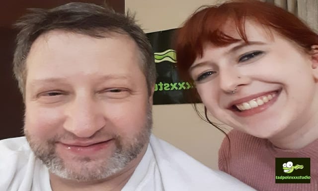Hannah Grace performs oral sex on a partner in a 4K VR scene with brunette features and 60 frames per second playback quality.