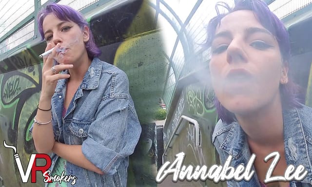 Annabel Lee smokes on a bridge in an outdoor solo fetish scene filmed in 60 FPS VR non POV quality.