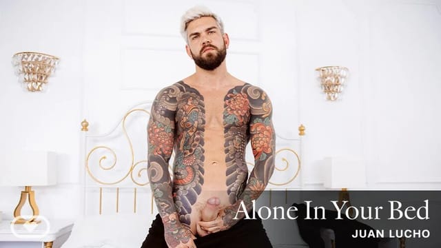 Juan Lucho performs solo in bed wearing VR headset filmed in 4K for VirtualRealGay