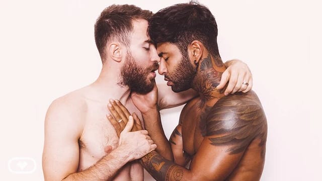 Charlie Cherry and Babylon Prince perform interracial anal and blowjobs in a VirtualRealGay VR POV scene with 60 FPS passthrough.