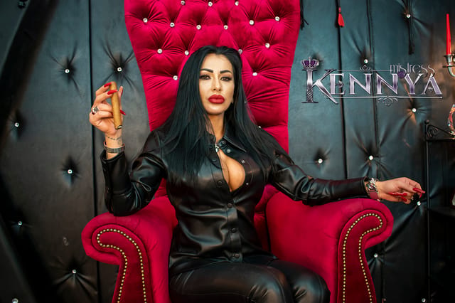 Mistress Kennya smokes a cigar during solo verbal humiliation in a 4K VR video