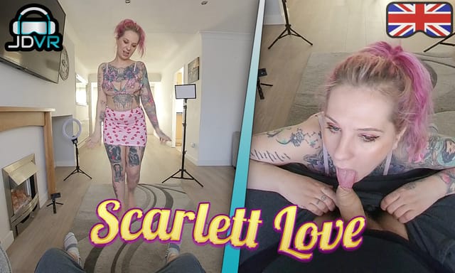 Redhead Scarlett Love performs a POV blowjob in a photography studio setting, captured in 4K VR with 60 FPS smoothness.
