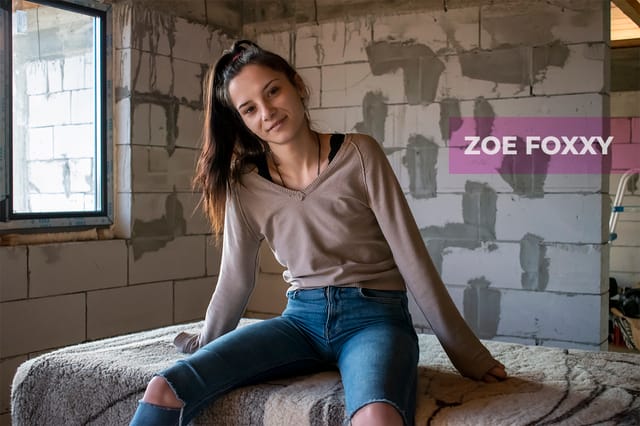 Zoe Foxxy receives a blowjob in an abandoned building during a 4K VR scene.