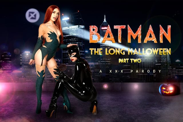 Kylie Rocket and Sera Ryder in Batman cosplay perform a POV blowjob in a dark setting, featuring 60 FPS VR passthrough.
