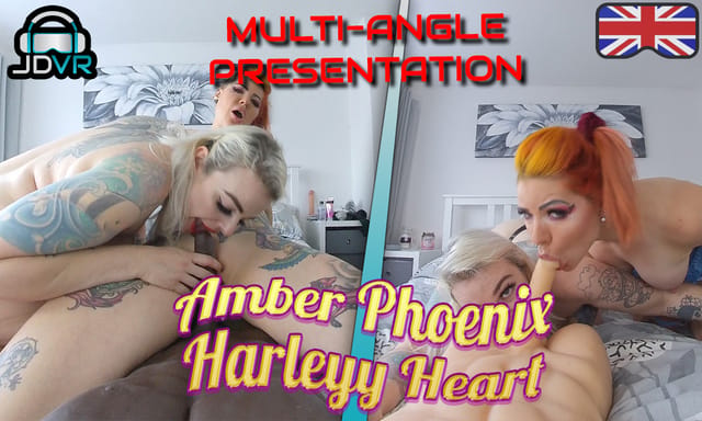Harleyy Heart and Amber Phoenix kiss in a VR foursome scene filmed in 4K POV with multi-angle camera work.