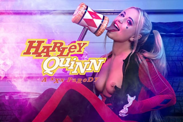 Lola Myluv in Harley Quinn cosplay performs a POV blowjob in a VR scene with 60 FPS European production quality.