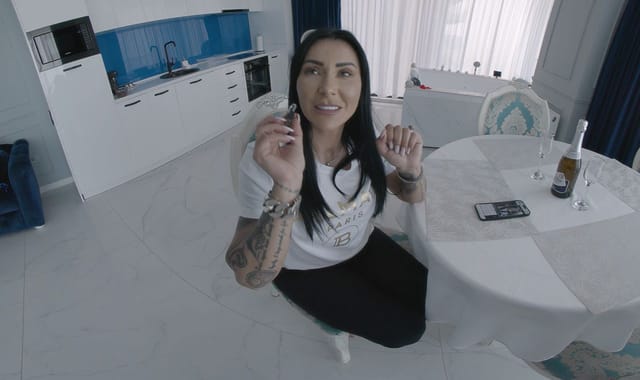 Brunette Mistress Kennya unpacks luggage during a BDSM vacation fantasy in this 4K VR POV scene with 60 FPS quality.