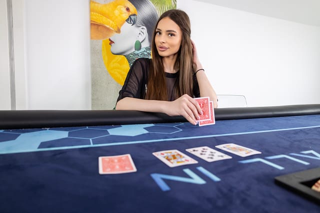 Bella Young plays solo poker in a 4K VR POV scene with 60 FPS smooth motion and 180 degree view.