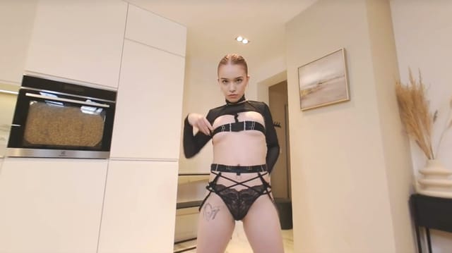 Redhead Wiki performs a solo dance routine in a POV shot for LIN VR, featuring 4K resolution and premium production quality.